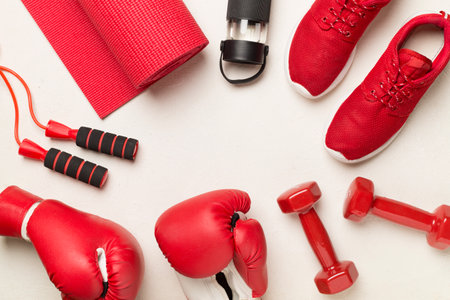Red sport equipment on concrete background, top viewの写真素材