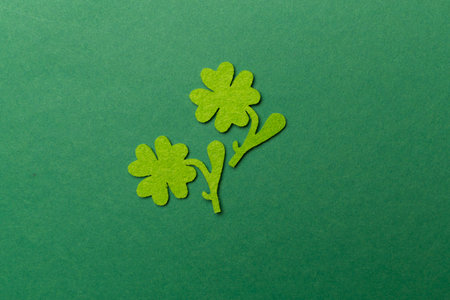 Felt clover on color background, top view. St. Patricks day conceptの写真素材