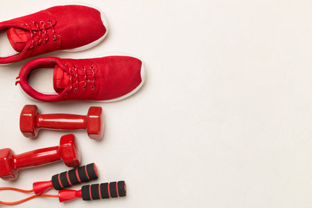 Red sport equipment on concrete background, top viewの写真素材