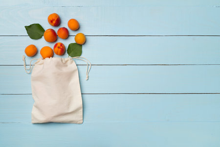 Composition with ripe apricots on wooden background, top view.の写真素材