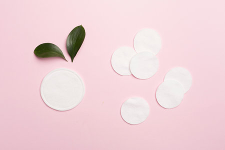 Reusable cotton pads with disposable ones on color background, top viewの写真素材