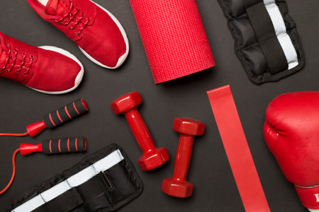 Red sport equipment on color background, top viewの写真素材