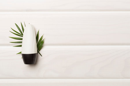 Natural deodorant on wooden background, top viewの写真素材