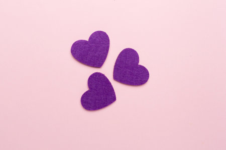 Felt hearts on color background, top viewの写真素材