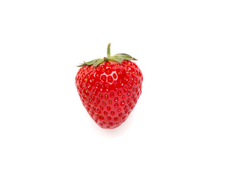Strawberry isolated on white background. Fresh ripe fruit closeupの写真素材