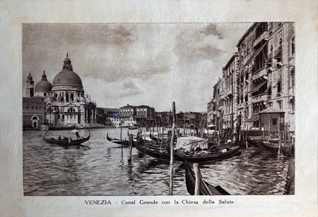ITALY - CIRCA 1910: A picture printed in Italy shows image of Grand Canal con la Chiesa della Salute in Venice, Vintage postcards "Italy" series, circa 1910のeditorial素材