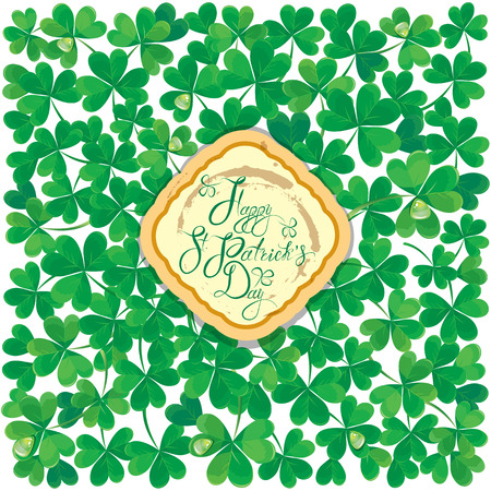 Holiday card with calligraphic words Happy St. Patrick`s Day in grundy frame. Shamrock green leaves  pattern on white background.のイラスト素材
