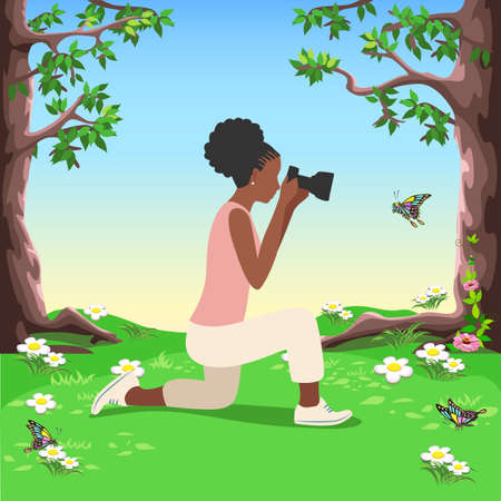 Beautiful black girl photographer with a camera looks into the lens and photographs a butterfly in a blooming forest glade. Vector illustration on white background.のイラスト素材