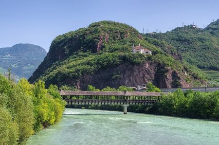 Bolzano Chiesa del Santo Sepolcro and riverの写真素材