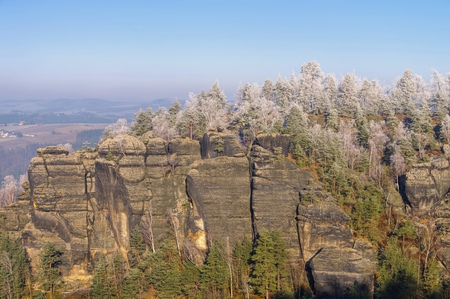 Elbe sandstone mountains in winter and hoarfrost, viewpoint Domerkerの写真素材
