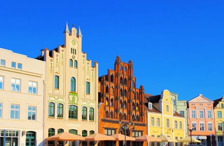 the old town Wismar in northern Germany, houses at the marketの写真素材