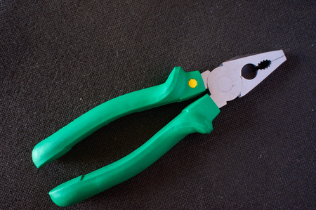 A green pliersの写真素材
