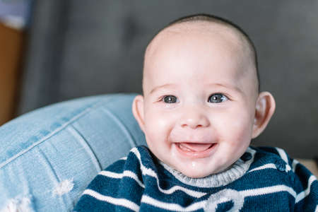 CLOSE UP OF CAUCASIAN BABY BOYの写真素材