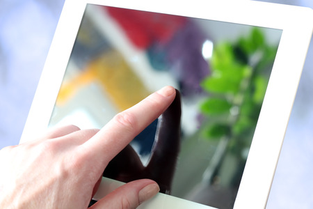 closeup image of busineswosman touching modern  digital tabletの写真素材