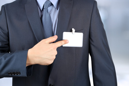 The business man showing a  Blank Badgeの写真素材