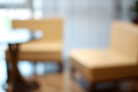 Abstract blurry restaurant with chairs and tableの写真素材