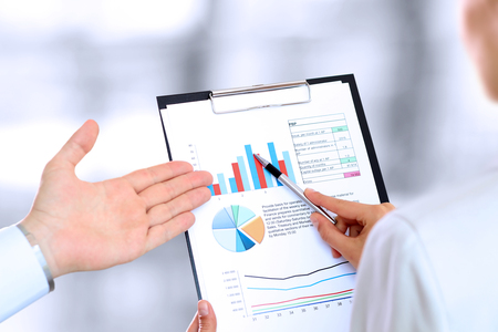 The Business colleagues working and analyzing financial figuresの写真素材