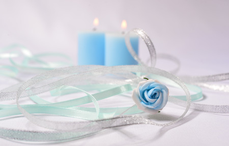wedding background with thin ribbons and candlesの写真素材
