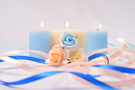 wedding background with thin ribbons and candlesの写真素材