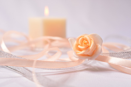 thin ribbons and candlesの写真素材