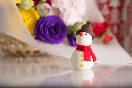 Selective focus on a snowman decorationの写真素材