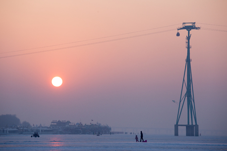 Father and son under the setting sunのeditorial素材