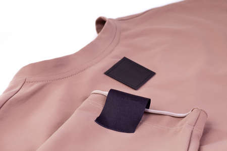 macro mock up fabric blank black patch for the brand logo on the arm and black eco leather tag on...