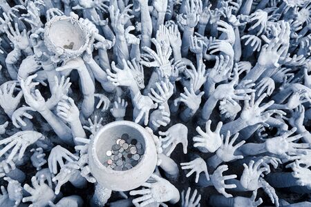 The Hands from hell in Wat Rong Khunの写真素材