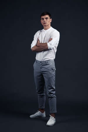Young man portrait in white shirt