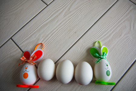 Easter eggs on wooden background. Happy Easter. Creative photo with easter eggs.