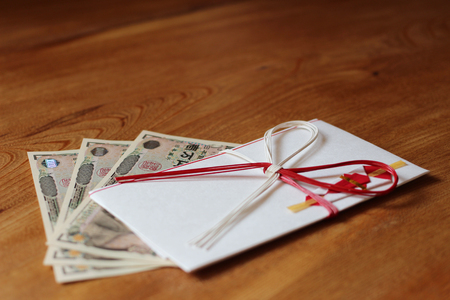Japanese envelop for gift: wood background /horizontalの写真素材