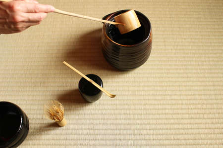 Japanese tea ceremony, water is put from the water for making green tea.の写真素材