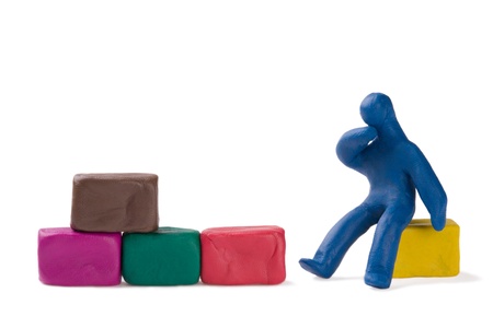 Thinking plasticine little bricklayer construction site.の写真素材