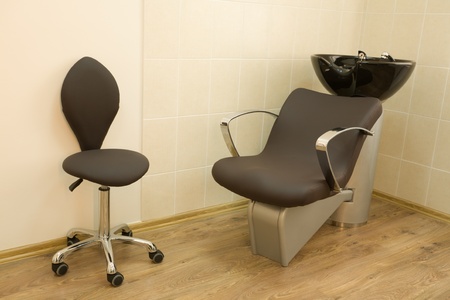 Chair-washing and chair barber in a barbershop.の写真素材