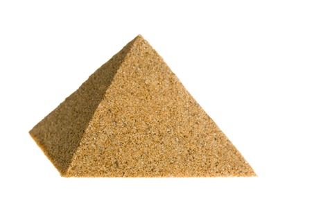 Pyramid of sand. Isolated on a white.の写真素材