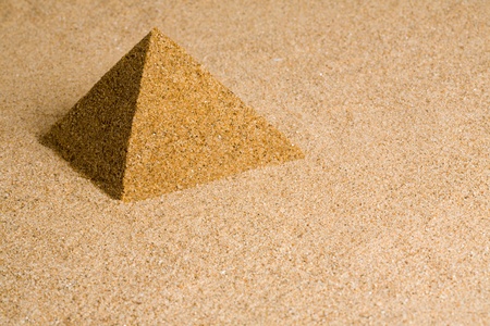 Sand pyramid on the sand.の写真素材