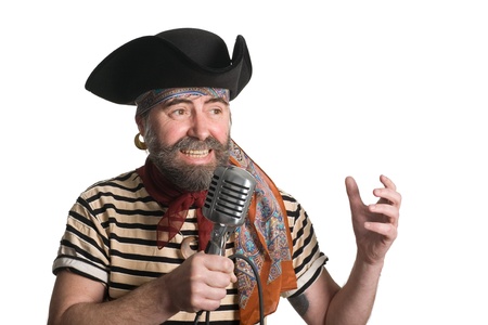 Singer dressed as sea pirate sings in an old microphone.の写真素材