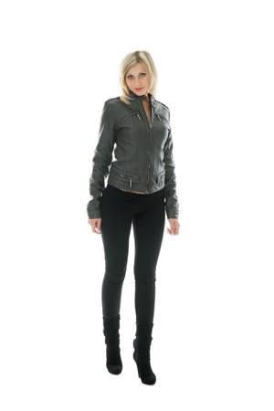 Beautiful girl in leather jacket and jeans.の写真素材