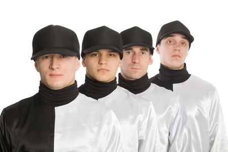 The team of young men standing in a row. 