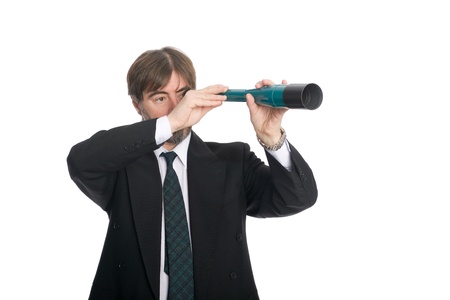 Businessman looking through a spyglass. Prospects for future business.の写真素材
