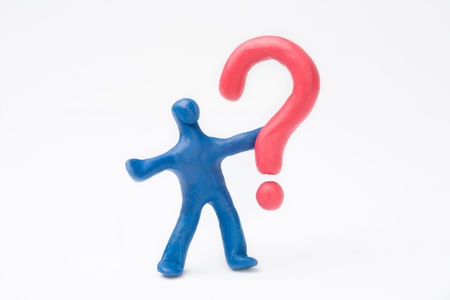 Plasticine person with a red Question Mark