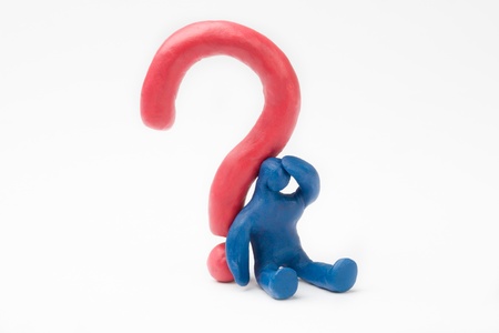 Plasticine person with a red Question Mark