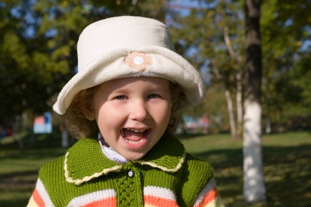 Little girl shouts, a joke.の写真素材