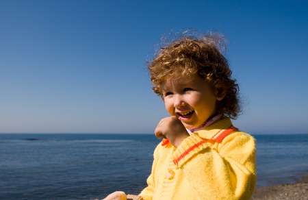 The little girl at the sea.の写真素材