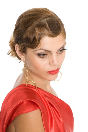 Portrait of a beautiful young woman in the red.の写真素材