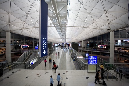 HONG KONG - OCTOBER 5: Hall of Terminal International Airport (Chek Lap Kok Airport) in the evening on October 5, 2011 in Hong Kong.のeditorial素材