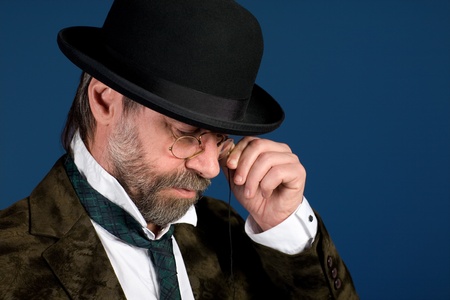 Thoughtful man in vintage pince nez 