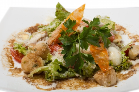 Warm salad with grilled scallops, crab and tiger shrimp.の写真素材