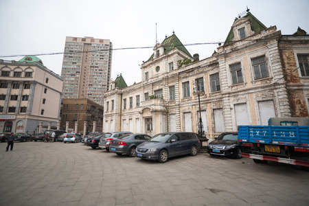 DALIAN, CHINA - JUNE 12, 2012: Famous Russian street in the Dalian morning. Russian on street there are many buildings built in the Russian style of the late XIX century - Beginning of XX century.のeditorial素材