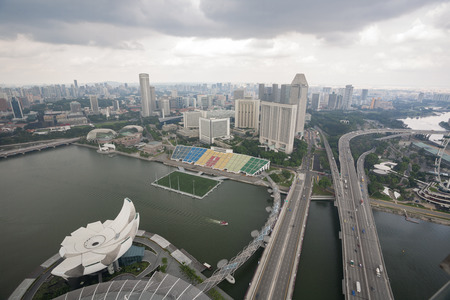 SINGAPORE - NOVEMBER 06, 2012: Rain clouds in the sky before the rain over Singapore. Weather in Singapore differs monsoon tropical climate, so here comes the big monthly rainfall. のeditorial素材